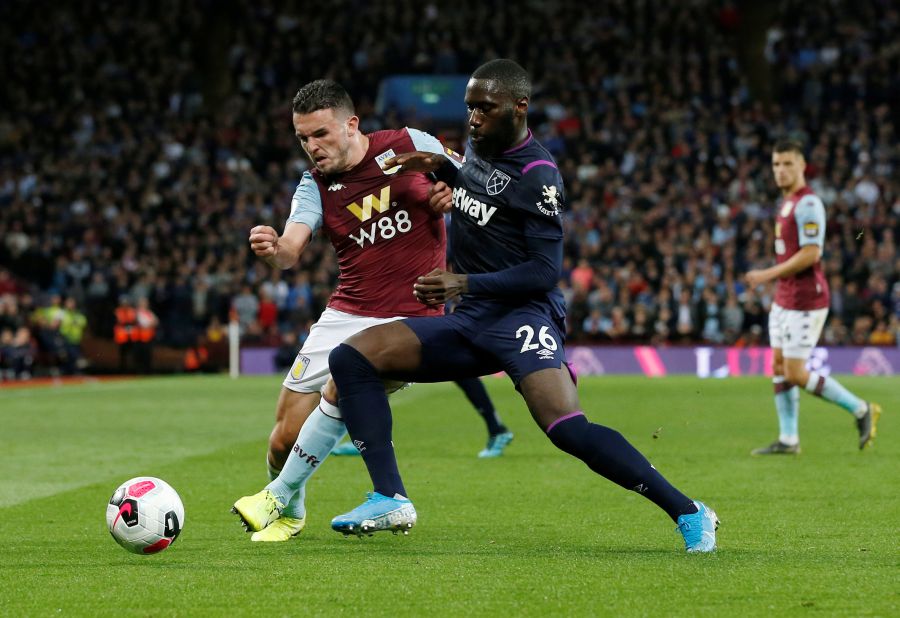 Ten-man Hammers hold on for point at Villa